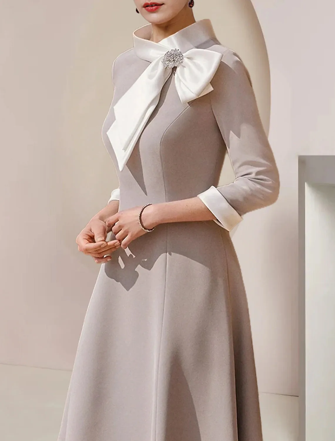 A-Line Mother of the Bride Dress Formal Wedding Guest Party Elegant High Neck Asymmetrical Tea Length Satin 3/4 Length Sleeve with Bow(s) Crystal Brooch